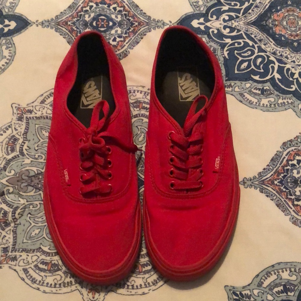 Men red low top vans